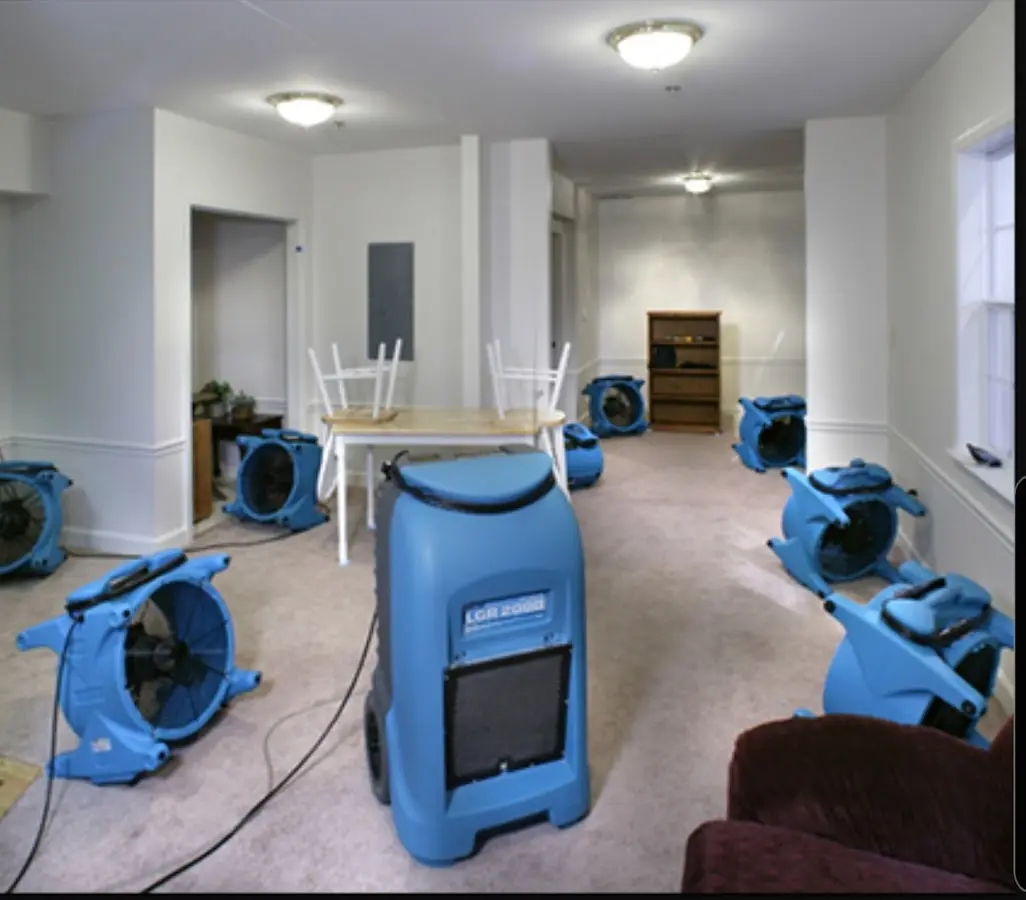 Air movers and dehumidifier setup for Water Damage Restoration in Lewisville
